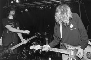 Krist Novoselic (left) and Kurt Cobain, onstage in 1991