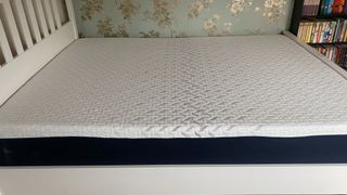 A queen Nectar Classic Memory Foam Mattress on our tester's wood bed frame