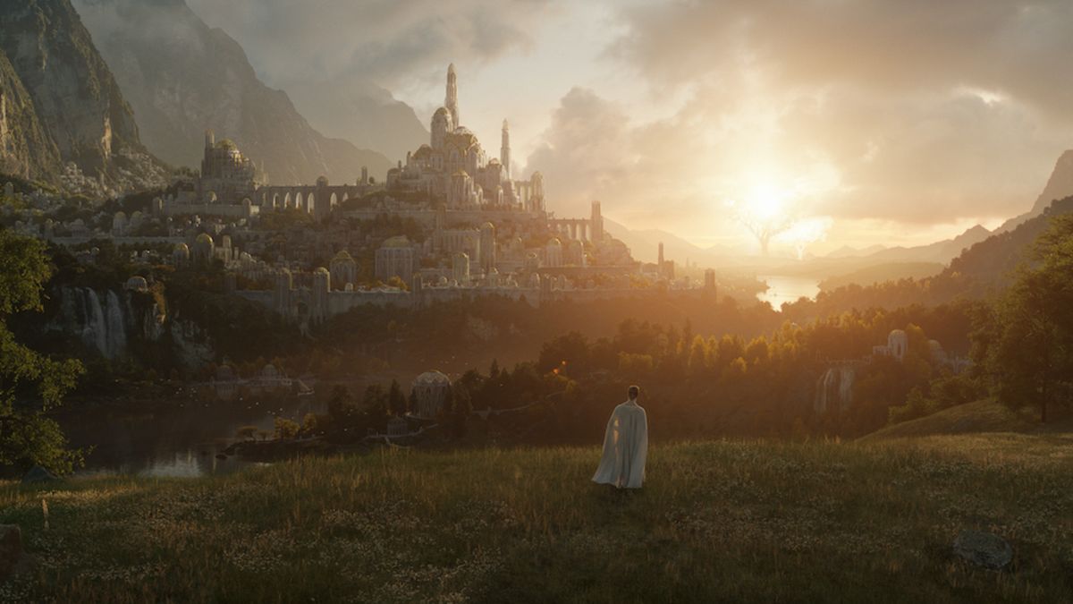 A mysterious figure stands off in the distance in a still image from Amazon&#039;s Lord of the Rings series