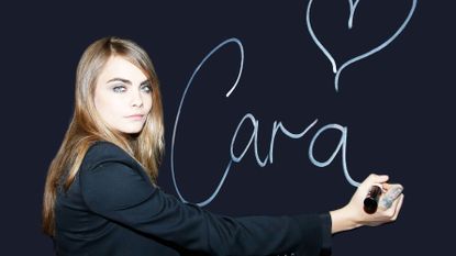 Cara Delevingne Writing Her Name