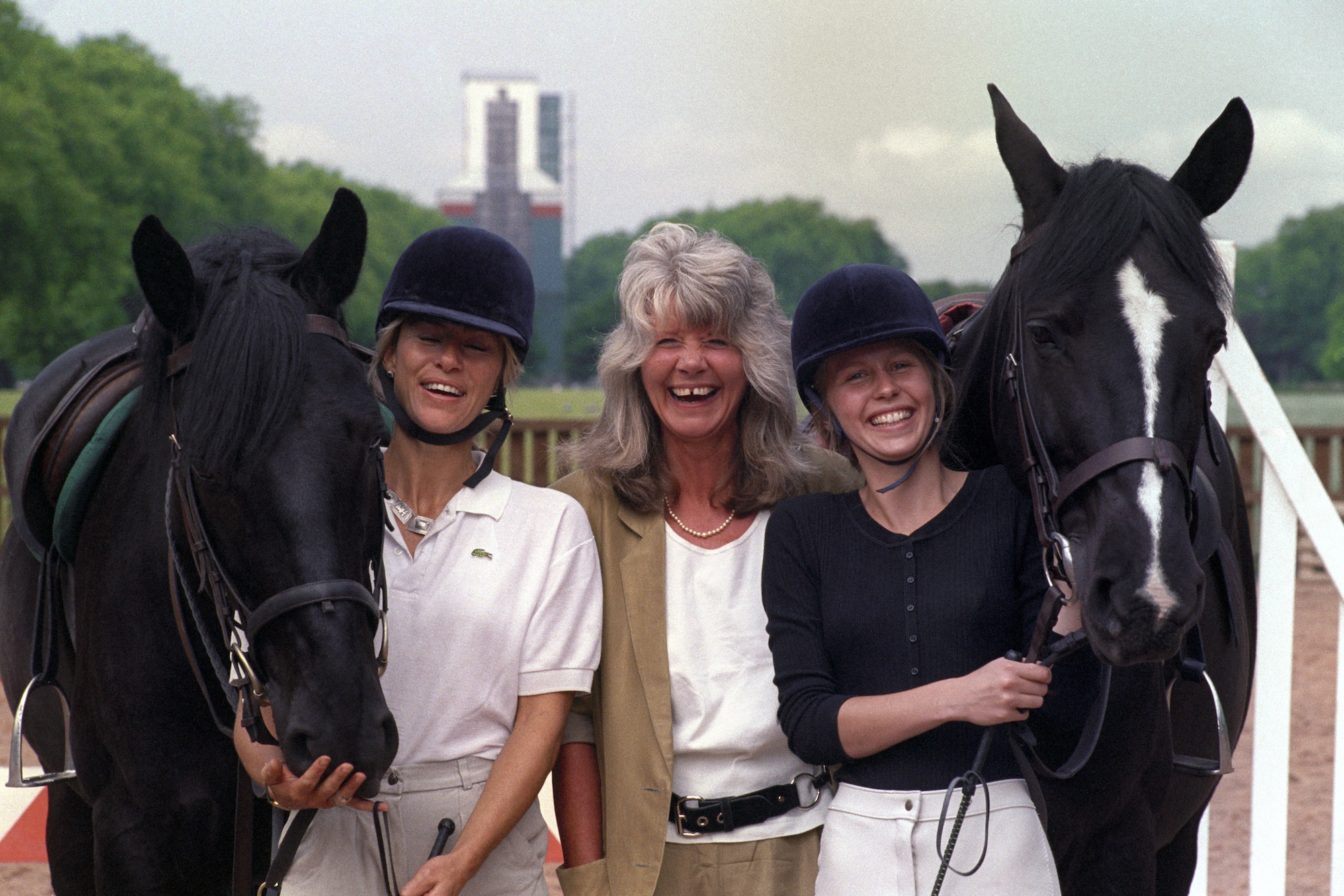 AUTHOR JILLY COOPER (CENTRE) WITH TWO OF THE CAST OF A NEW ANGLIA TV 2 PART SAGA OF LUST AND RIVALRY IN THE RITZY WORLD OF INTERNATIONAL SHOW JUMPING CALLED "RIDERS". PICTURED LEFT IS BELINDA MAYNE (LAVINIA) WITH OPERA, AND CAROLINE WALDRON (FEN), WITH HE