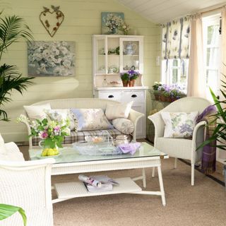 summer house with sofa set and tea table