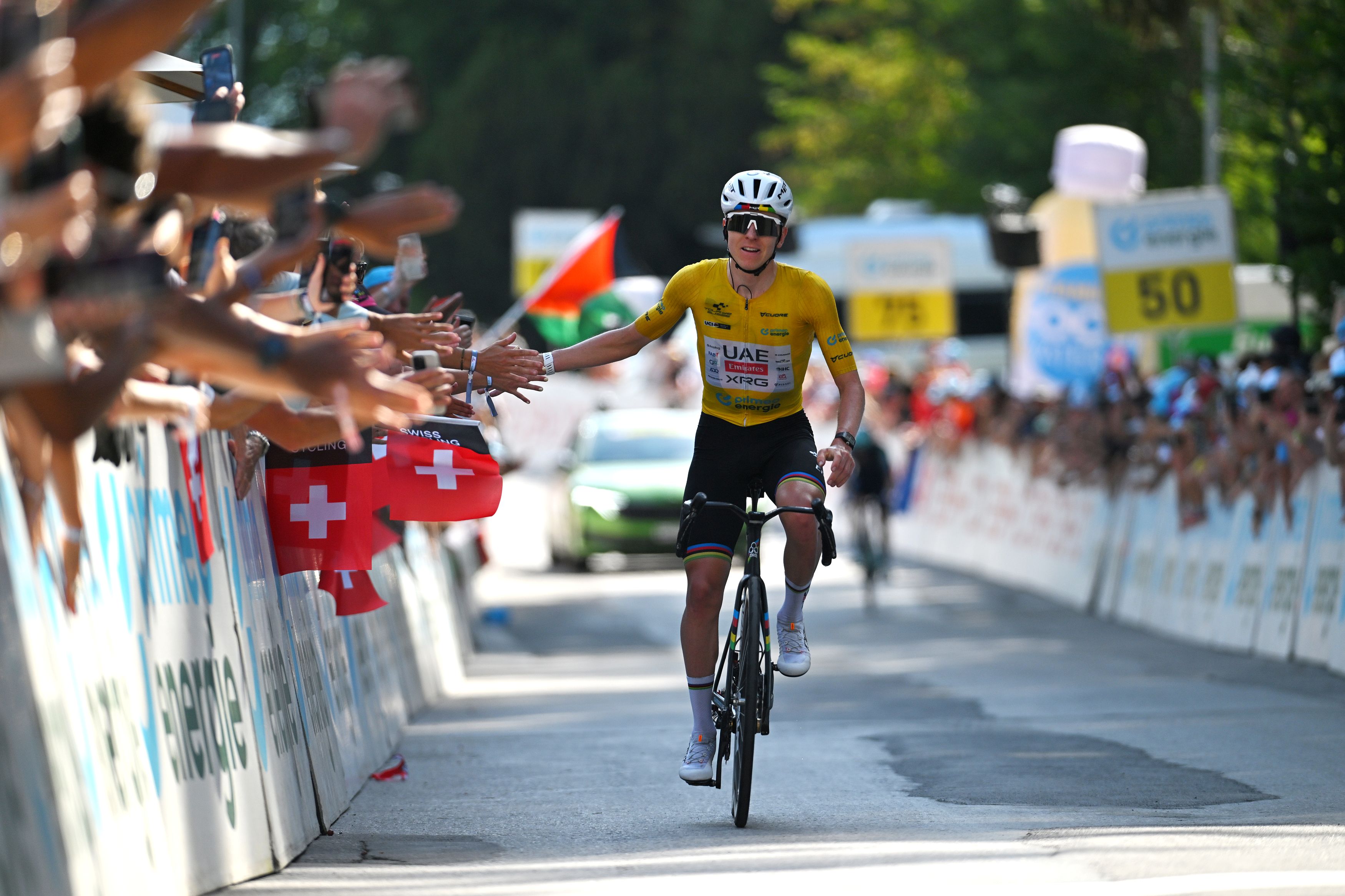 VILLARS-SUR-OLLON, SWITZERLAND - JUNE 21: Tadej Pogacar of Slovenia and UAE Team Emirates - XRG - Yellow Leader Jersey celebrates at finish line as stage winner during the 89th Tour de Suisse 2026, Stage 5 a 150.7km stage from Villars-sur-Ollon to Villars-sur-Ollon 1249m / #UCIWT / on June 21, 2026 in Villars-sur-Ollon, Switzerland. (Photo by Tim de Waele/Getty Images)