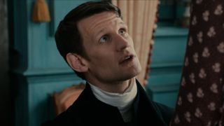 Matt Smith kneeling as Parson Collins in Pride and Prejudice and Zombies
