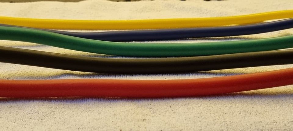 Whatafit resistance bands laid out on floor