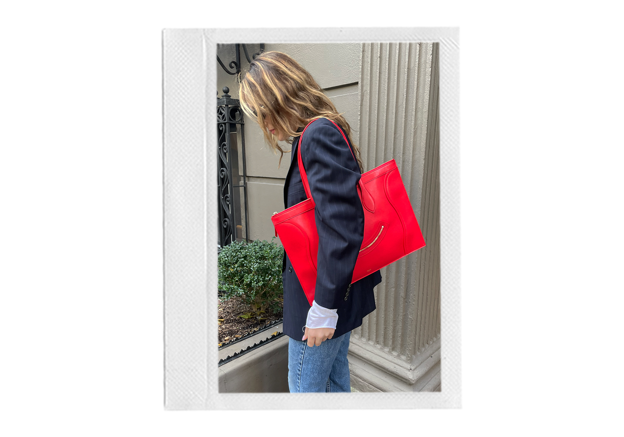 senior fashion editor Anna LaPlaca carrying the Celine Smiling Luggage Flat Cabas Tote