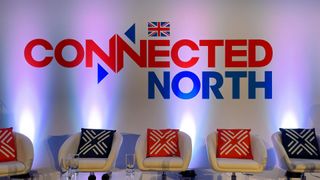 Connected North 2022 logo on a stage