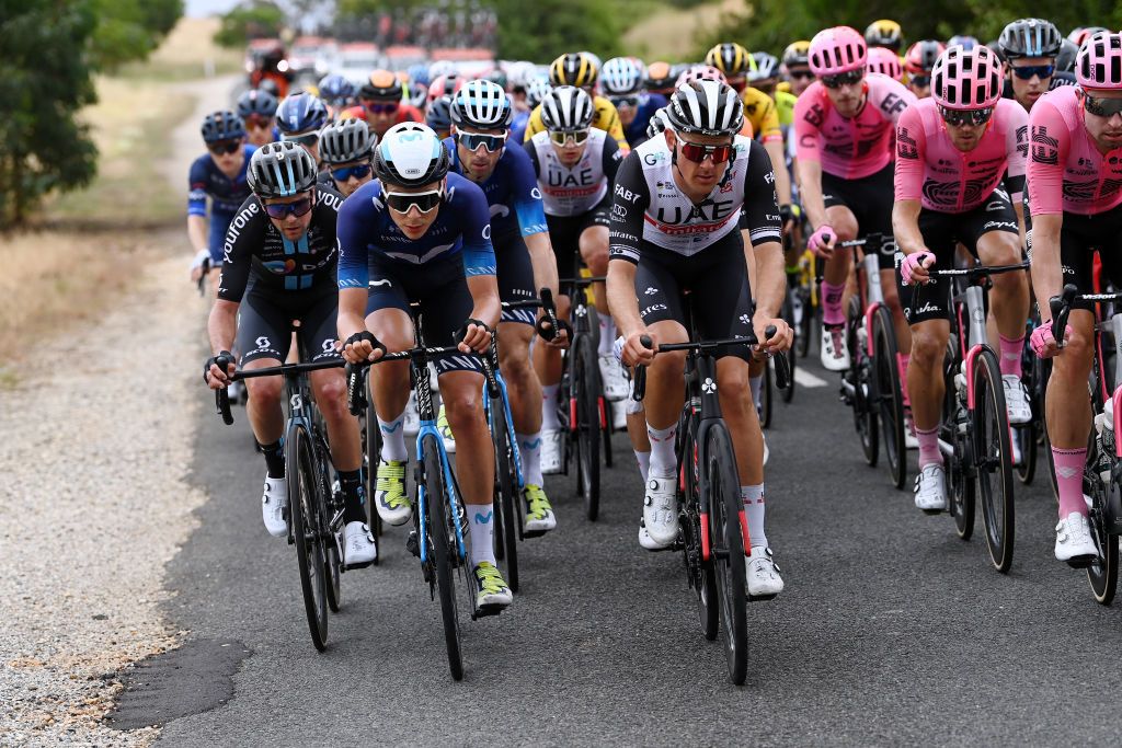 TANUDAZ AUSTRALIA JANUARY 18 LR Romain Combaud of France and Team DSM Johan Jacobs of Switzerland and Movistar Team and Sjoerd Bax of The Netherlands and UAE Team Emirates compete during the 23rd Santos Tour Down Under 2023 Stage 1 a 1499km stage from Tanunda to Tanunda on January 18 2023 in Tanunda Australia Photo by Tim de WaeleGetty Images