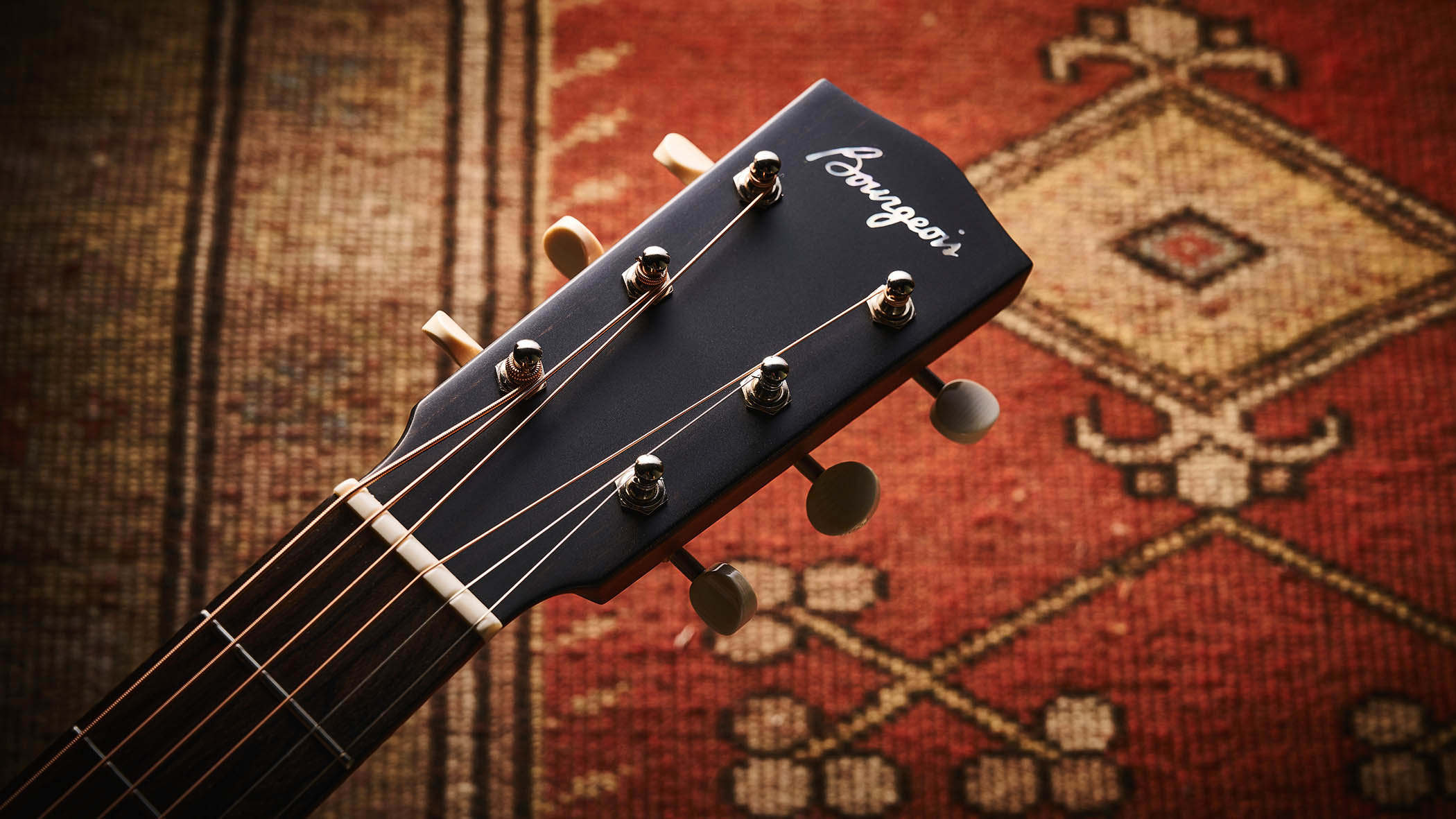 Bourgeois Slope D Standard T/S: Inspired by the J-45, this Touchstone series acoustic has. a beautiful high-gloss finish with a tiger-stripe pickguard