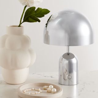 A silver domed table lamp from Net-A-Porter
