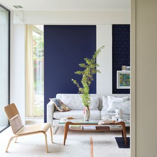 Living room with walls painted in Scotch Blue and Snow White