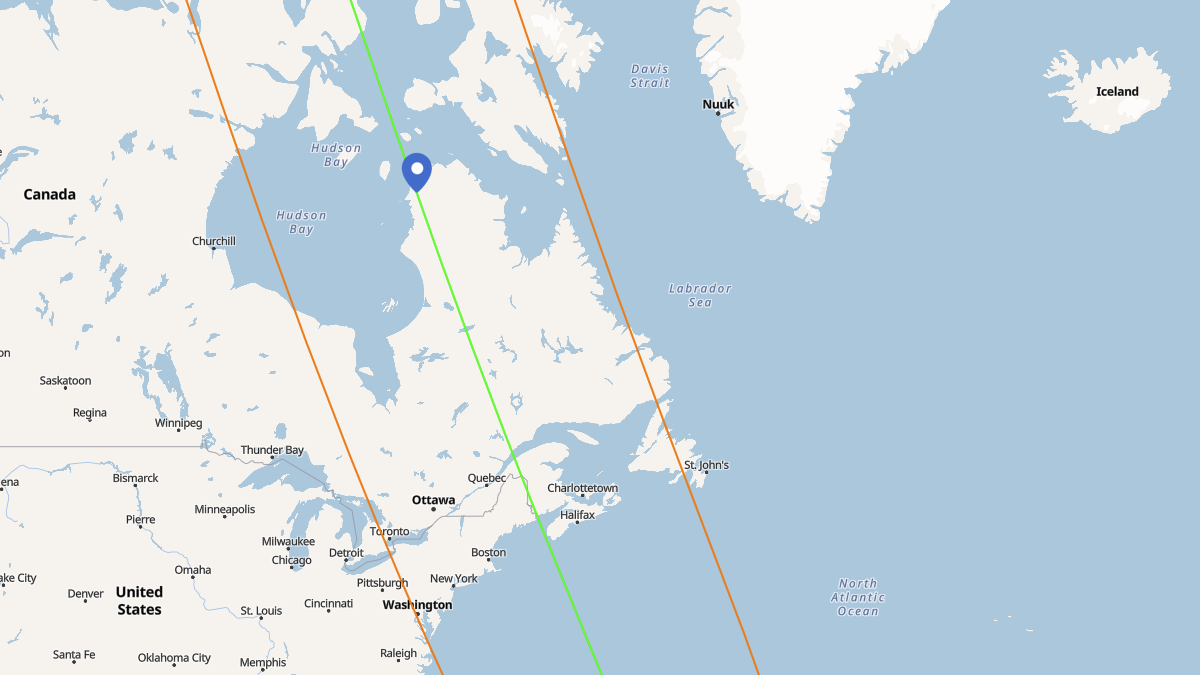 The path of the partial solar eclipse through North America on March 29, 2025, showing the sunrise line and the point of maximum eclipse.