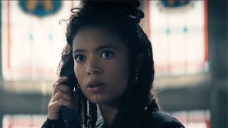 Marie holding a telephone receiver to her right ear in Gen V season 2 episode 7