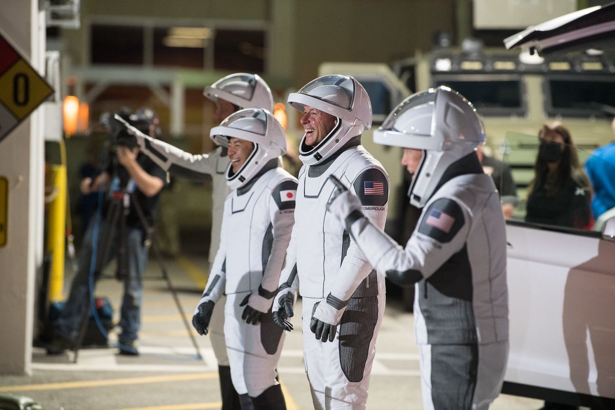 The Crew-2 astronauts smile as they bid farewell in a walkout dress rehearsal on April 18 for their launch on a SpaceX Crew Dragon and Falcon 9 rocket on April 22, 2021. From left to right they are: Thomas Pesquet of the European Space Agency, Akihiko Hoshide of the Japan Aerospace Exploration Agency and NASA astronauts Shane Kimbrough and Megan McArthur.