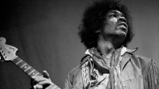 A photograph of Jimi Hendrix on stage