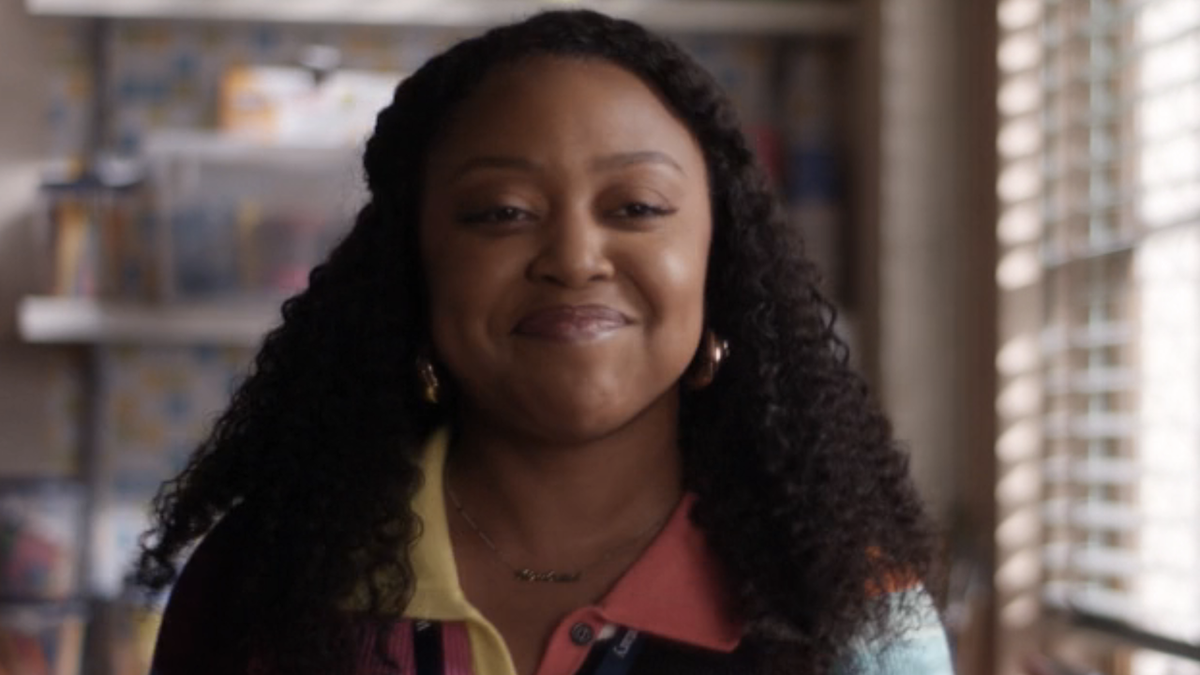 Quinta Brunson smiling as Janine in Season 3 of Abbott Elementary