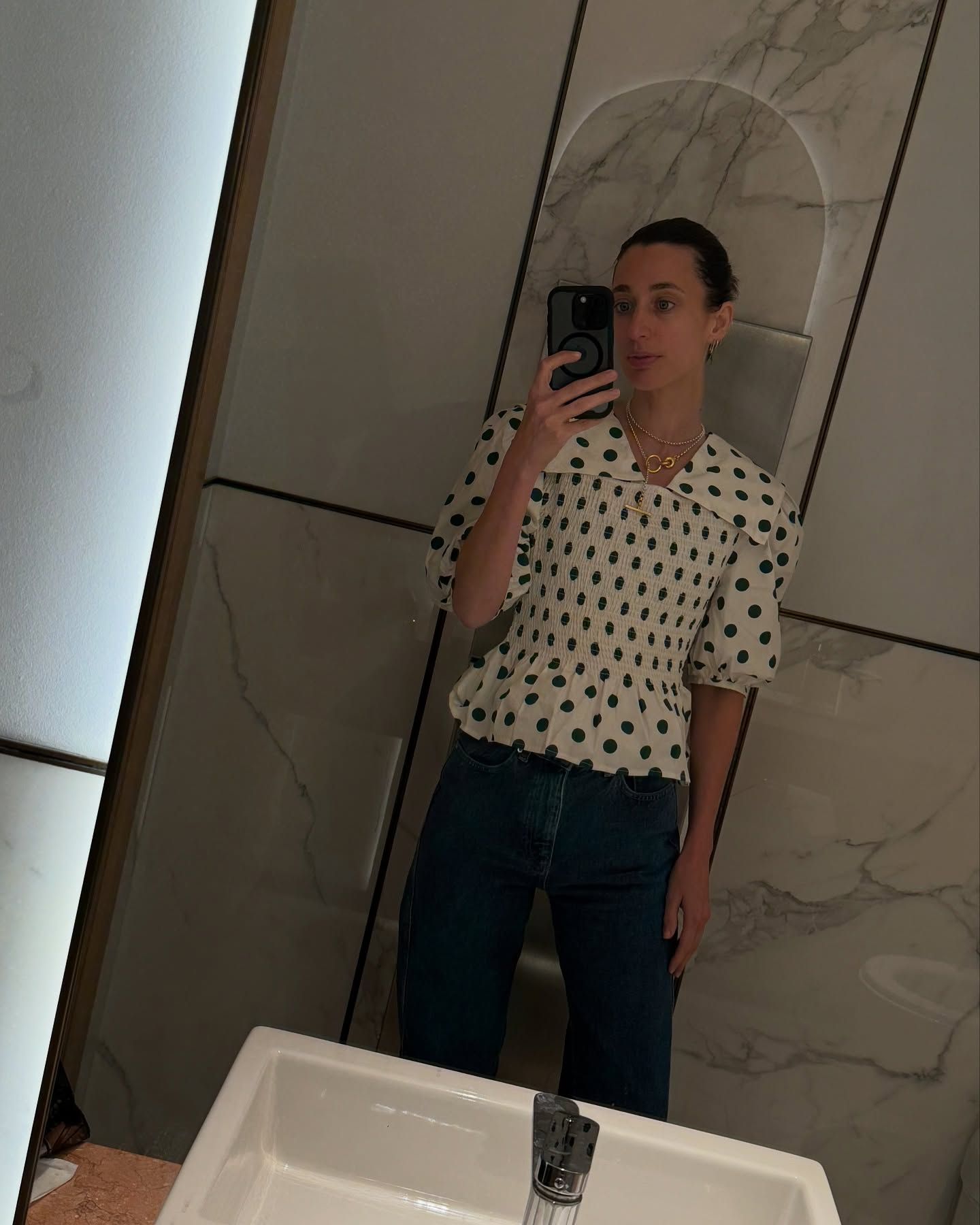 Influencer wears the Shrimps blouse.