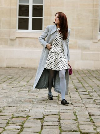 woman wearing a polka dotted dress