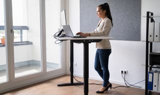 woman working at standing desk
