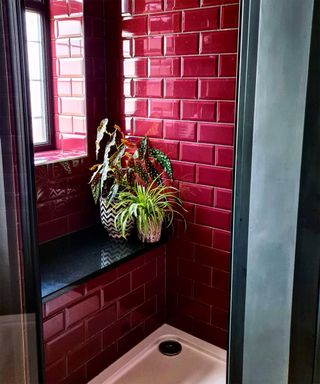 Red metro tile built-in shower bench idea by Julie Hemmings