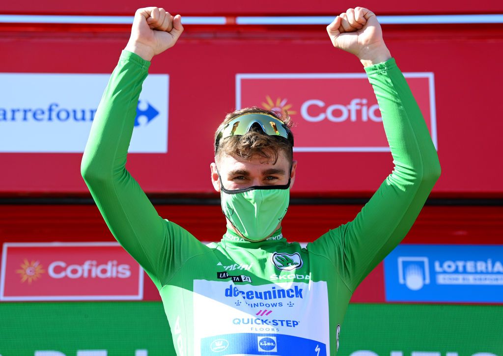 MOLINA DE ARAGON SPAIN AUGUST 17 Fabio Jakobsen of Netherlands and Team Deceuninck QuickStep celebrates winning the green points jersey on the podium ceremony after the 76th Tour of Spain 2021 Stage 4 a 1639km stage from El Burgo de Osma to Molina de Aragn 1134m lavuelta LaVuelta21 on August 17 2021 in Molina de Aragn Spain Photo by Stuart FranklinGetty Images