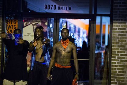 Last night in Ferguson: Images from a frustrated city
