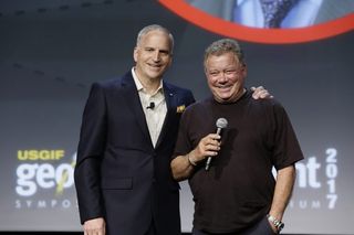 Sci-fi celebrity William Shatner meets GEOINT celebrity Robert Cardillo, director of the National Geospatial-Intelligence Agency, at the annual GEOINT Symposium, June 5, 2017.