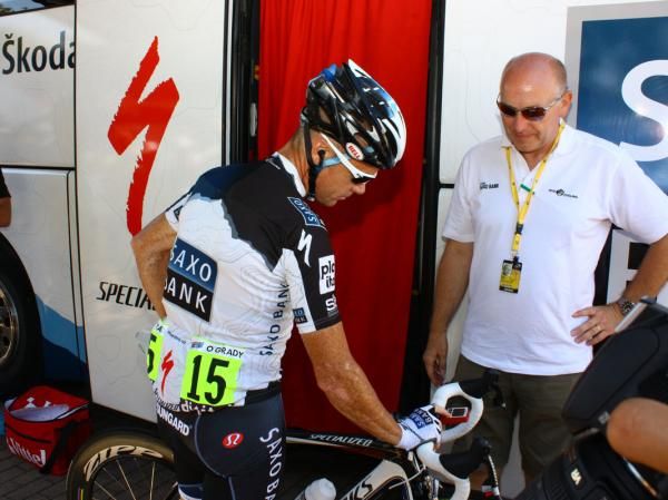 Stuart O'Grady checks his bike