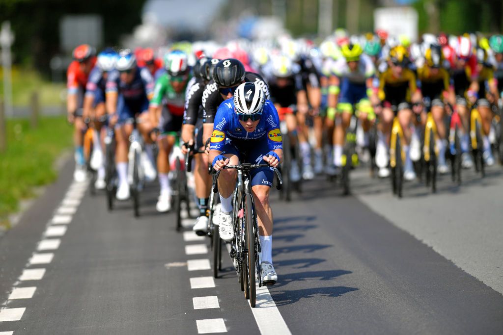 ARDOOIE BELGIUM SEPTEMBER 02 Remco Evenepoel of Belgium and Team Deceuninck QuickStep leads the peloton during the 17th Benelux Tour 2021 Stage 4 a 1661km stage from Aalter to Ardooie BeneluxTour on September 02 2021 in Ardooie Belgium Photo by Luc ClaessenGetty Images