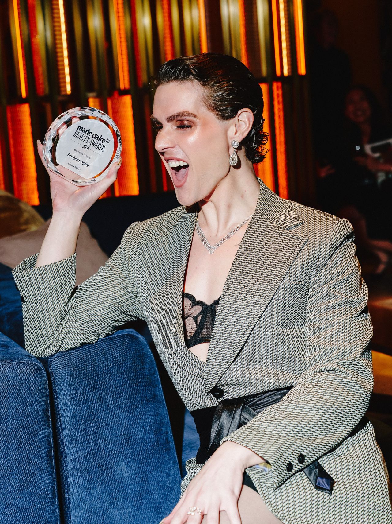 a white person in a blazer