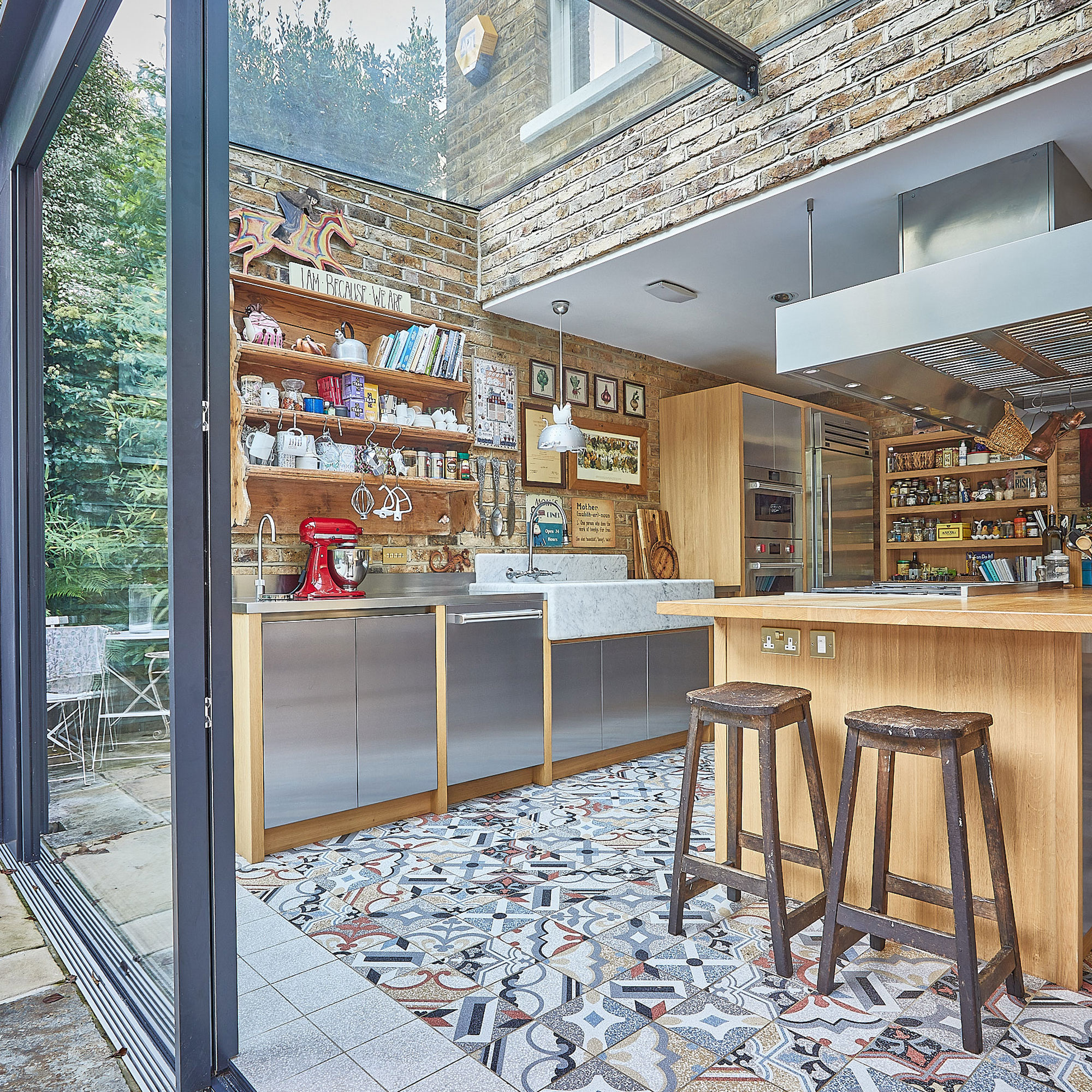 glass kitchen extension with wooden kitchen