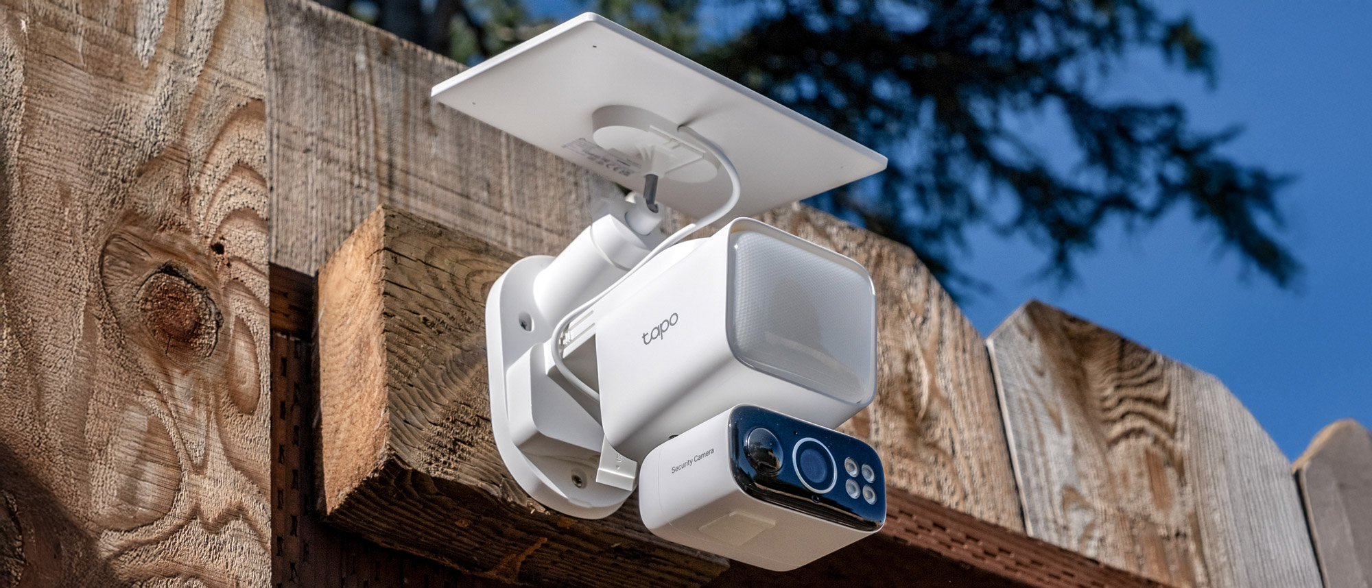 A TP Link Tapo C615F security camera mounted to a fence