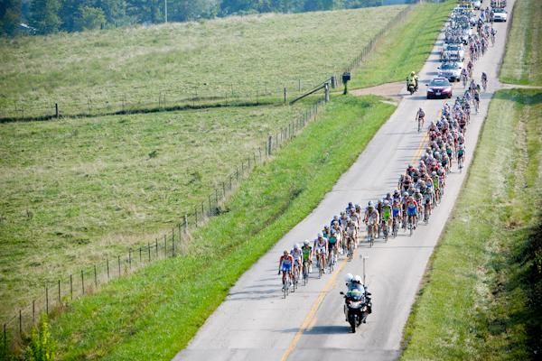 The peloton strings out on a flat section of the day's stage.