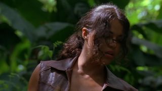 Michelle Rodriguez walking through the jungle looking sweaty in Lost