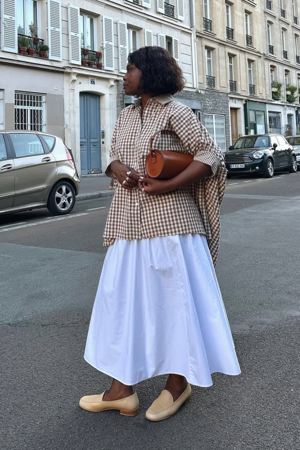 @frannfyne wears gingham shirt white midi skirt