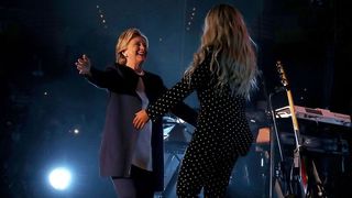 Beyoncé and Hillary Clinton hugging onstage