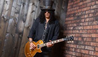Slash with his Gibson "Victoria" Les Paul Standard Goldtop