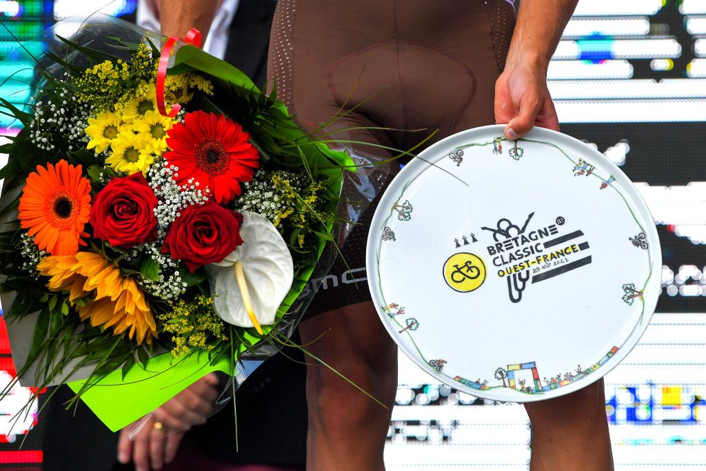 PLOUAY FRANCE AUGUST 29 Detailed view of Benoit Cosnefroy of France and Ag2R Citroen Team celebrates winning the race on the podium ceremony after the 85th Bretagne Classic OuestFrance 2021 a 251km race from Plouay to Plouay OuestFrance on August 29 2021 in Plouay France Photo by Luc ClaessenGetty Images