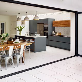 kitchen area with grey worktop and dining table
