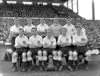 England's line-up against Wales in 1949: (top, l-r) John Aston, Bert Mozley, Neil Franklin, Bert Williams, Jimmy Dickinson, Johnny Hancocks; (front, l-r) Tom Finney, Jackie Milburn. Billy Wright, Stan Mortensen, Len Shackleton.