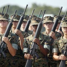 Soldier, Social group, Gun, Military uniform, Uniform, Headgear, Team, Military organization, Military, Troop, 