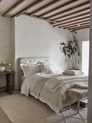 Relaxing bedroom with White Company bedding and throws