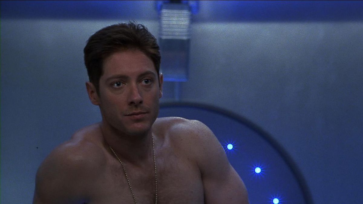 James Spader being very seductive and topless in <b>Supernova</b> (2000). 