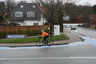 Image shows a person riding on cycle paths to the trails in Denmark