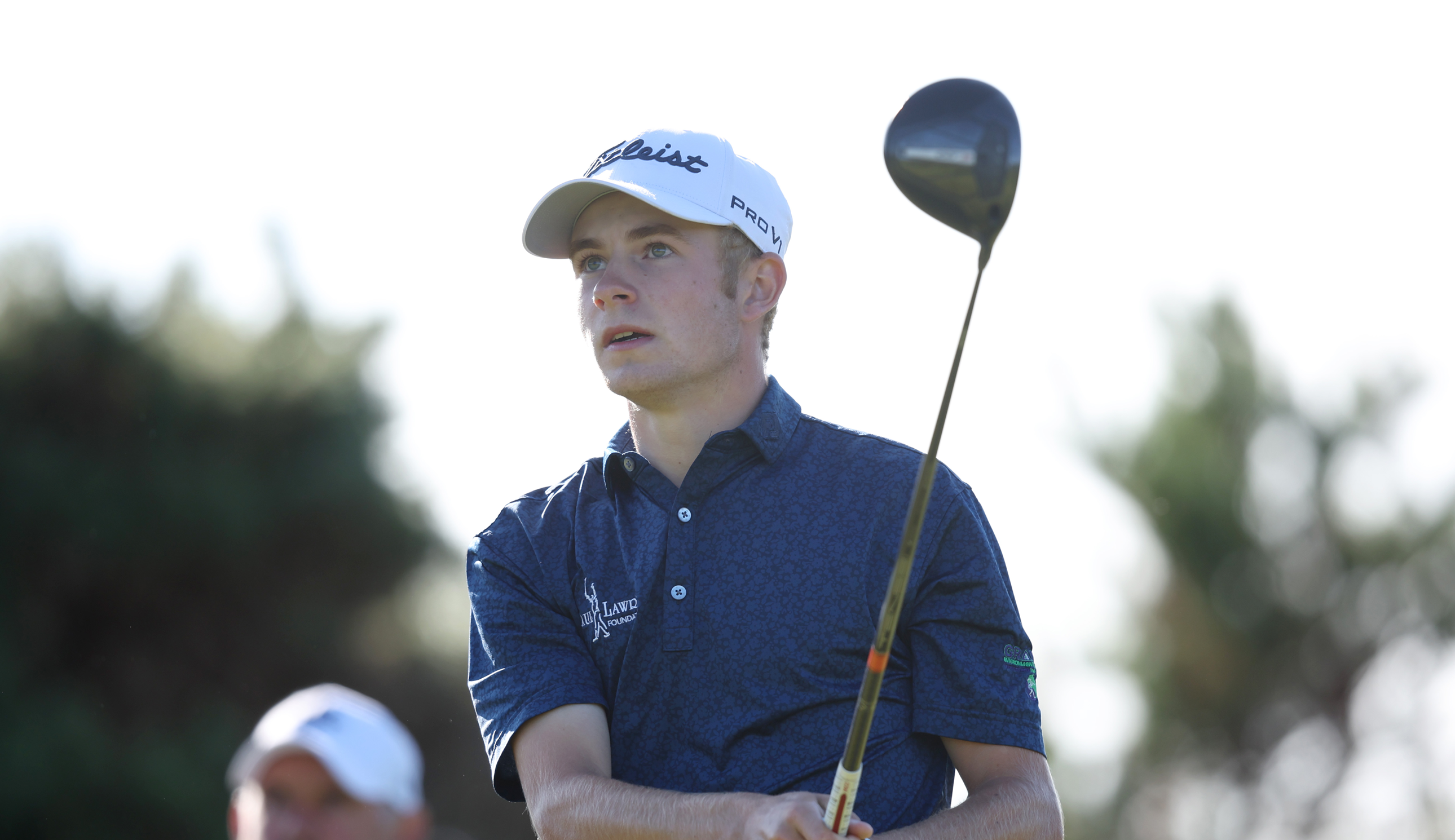 Connor Graham hits a driver off the tee and watches it