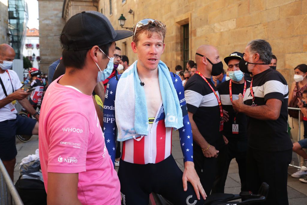 SANTIAGO DE COMPOSTELA SPAIN SEPTEMBER 05 Lawson Craddock of United States and Team EF Education Nippo speaks with his team coach after the 76th Tour of Spain 2021 Stage 21 a 338 km Individual Time Trial stage from Padrn to Santiago de Compostela lavuelta LaVuelta21 ITT on September 05 2021 in Santiago de Compostela Spain Photo by Gonzalo Arroyo MorenoGetty Images