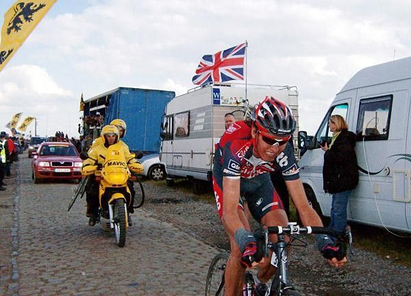 Johan Vansummeren (Silence-Lotto) in his unmistakable style, zooming across the rough roads.