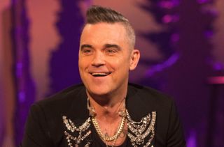 Guest Robbie Williams.