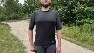 Front view of man wearing a Ciovita Opera Trail Tee