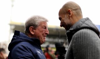 Crystal Palace manager Roy Hodgson (left) and Manchester City manager Pep Guardiola (right) before kick-off during a Premier League match at Selhurst Park, London